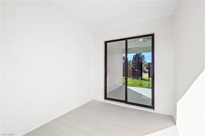 Empty room featuring light wood-style flooring