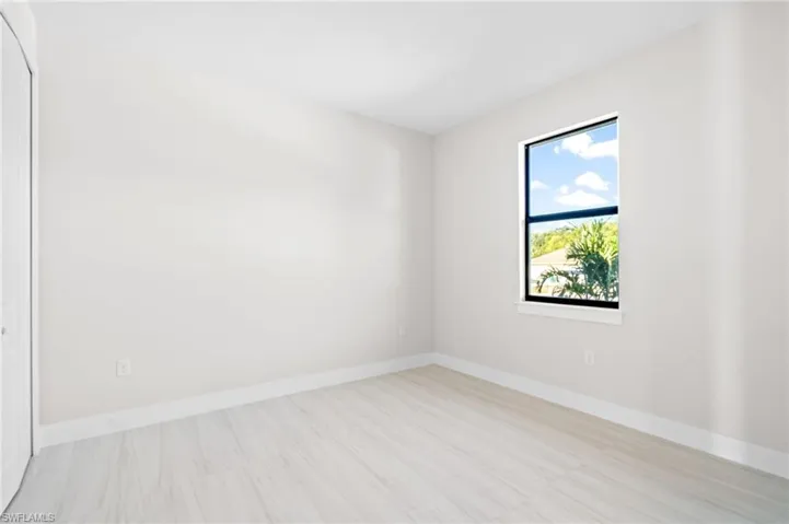 Empty room with baseboards