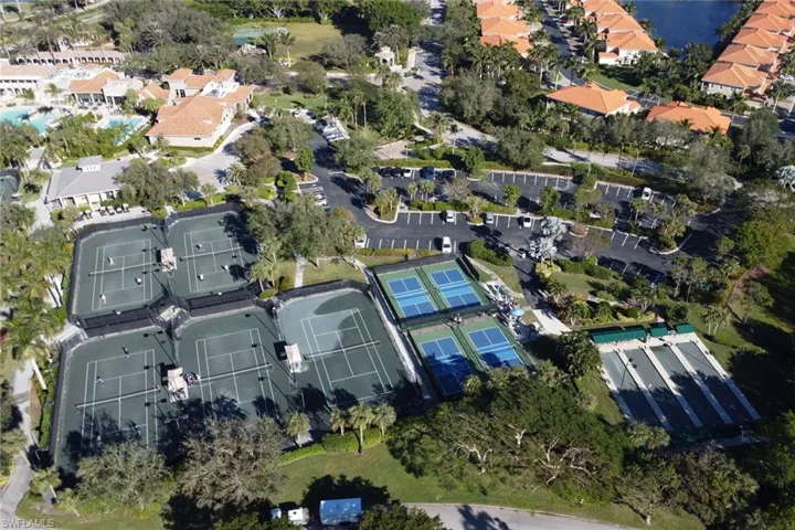 Aerial overview of property's location with nearby suburban area