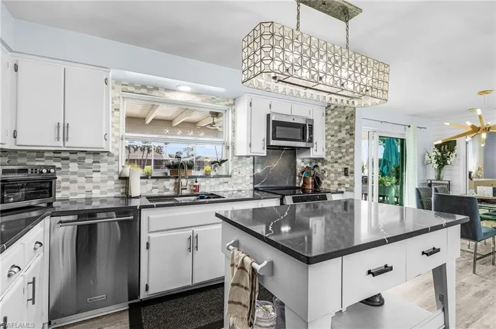 In person the flooring is a light tan.