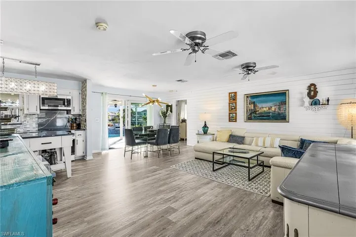 In person the flooring is a light tan.