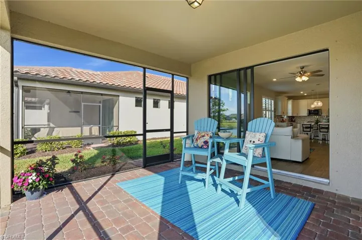 Sunroom with a ceiling fan