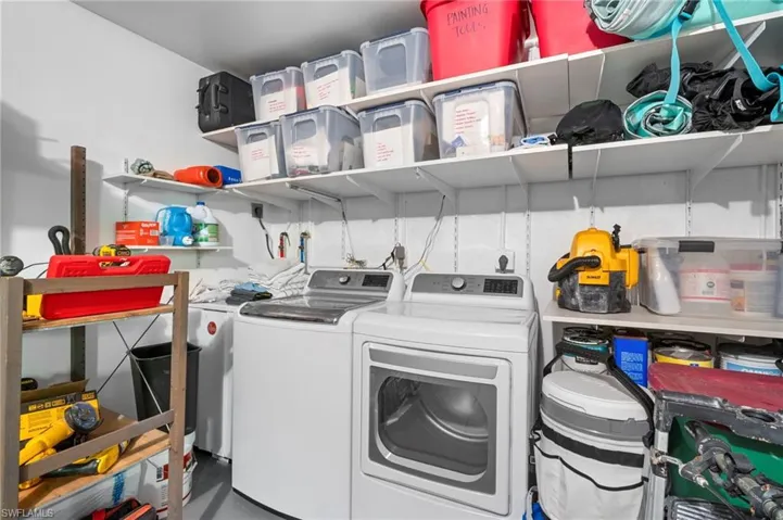 Laundry room with washing machine and dryer