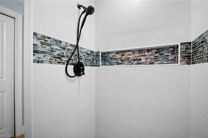 Bathroom view of tiled shower