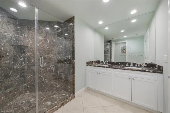 Guest bath with separate jacuzzi soaking tub and walk-in shower