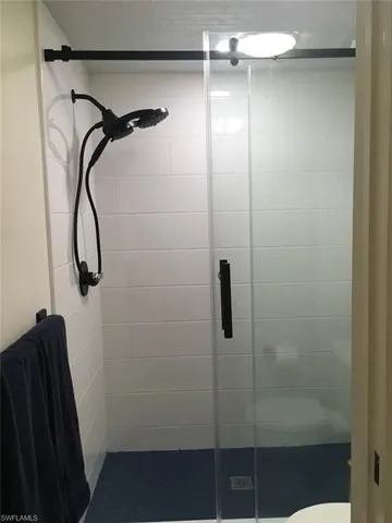 Full bathroom with a stall shower