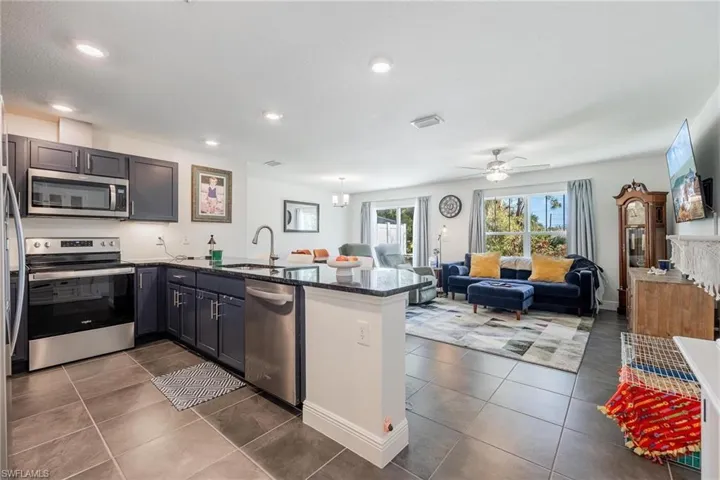 Kitchen overlooks family room and dining area