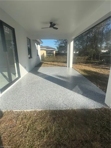 View of patio featuring ceiling fan