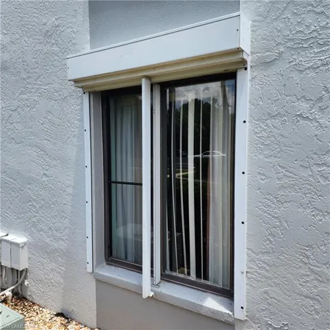 All Windows & Porch Have Roll-Down Storm Shutters