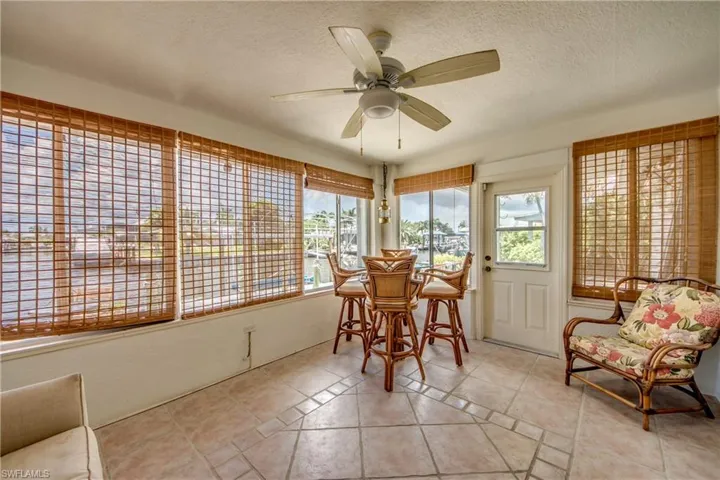 Sunroom with ceiling fan