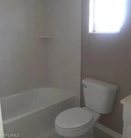 Bathroom featuring vanity and bathing tub / shower combination