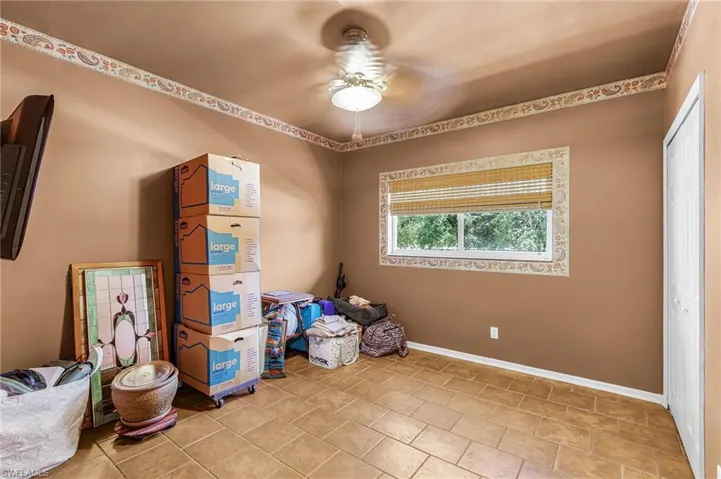 Contents were photographed, but do not convey. Guest bedroom.