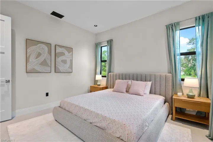 Bedroom featuring baseboards
