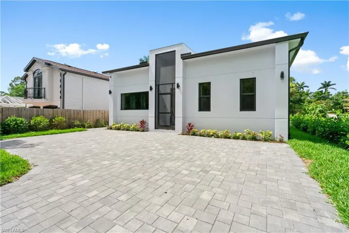 Modern home featuring stucco siding