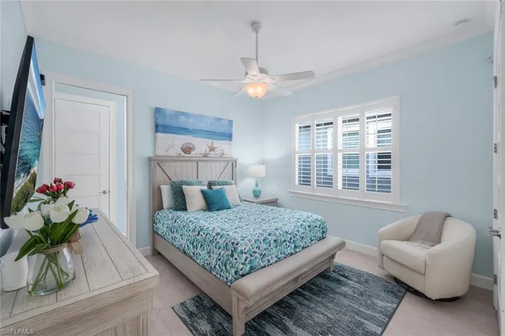 Bedroom featuring baseboards and a ceiling fan