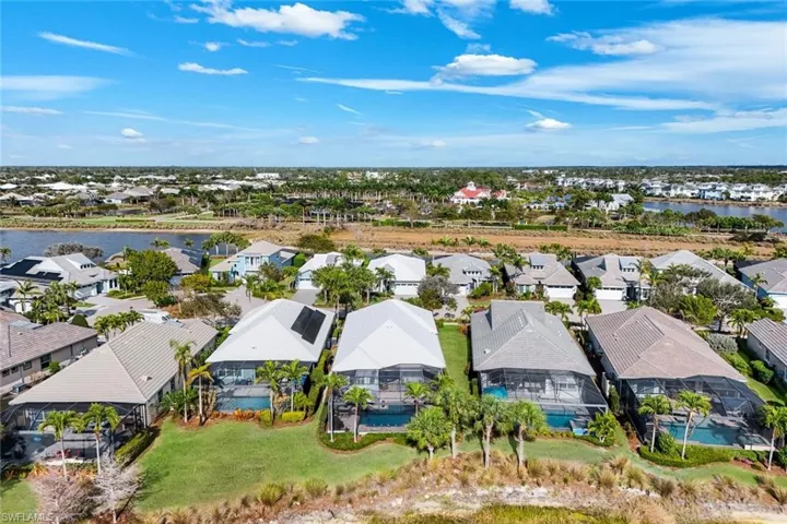 Aerial view of residential area with a nearby body of water