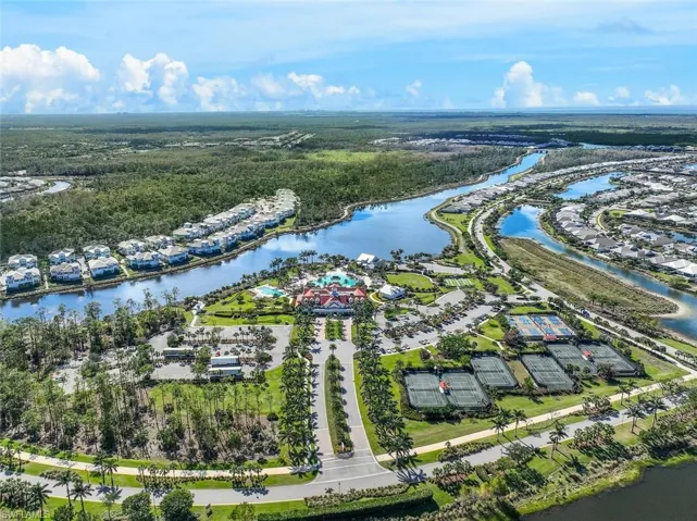 Aerial view of residential area with a nearby body of water