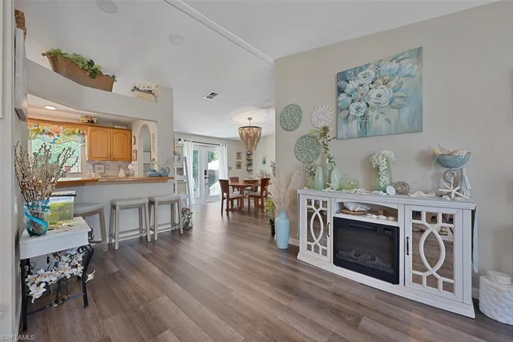 Living room featuring dark wood-type flooring