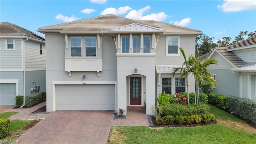 View of front of home featuring a garage