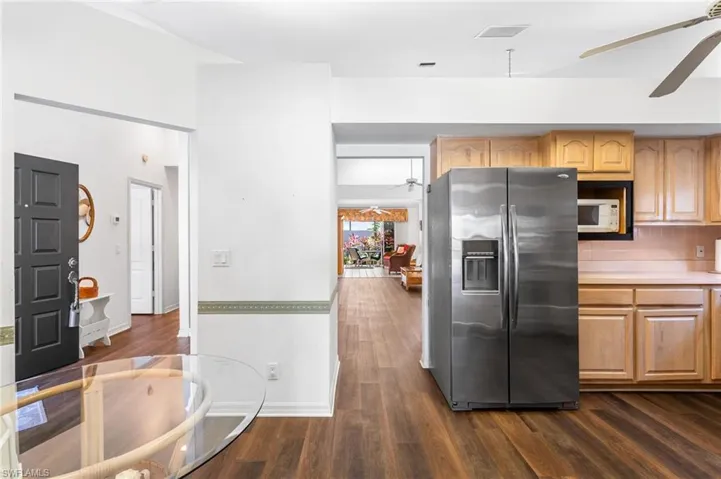 The spacious kitchen has stainless appliances, plenty of cabinet space and a floor-to-soffit pantry. The ceiling vaults up toward the great room, allowing more light in and the sense of even more space. The soffits are open above, meaning no load-bearing walls to worry about, if you want to open up the space to the great room.