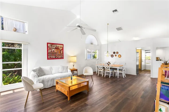 Spacious great room has vaulted ceilings, great light and so much room!