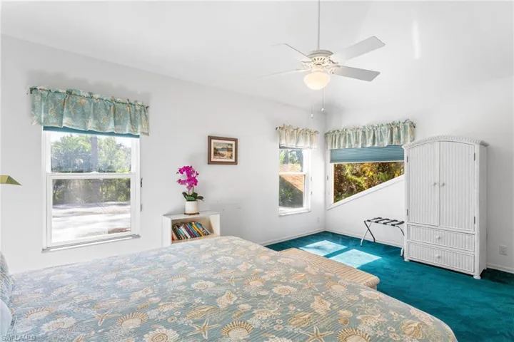 Can there really be two "primary" bedrooms? Yes! The second-floor primary suite has room for a king bedroom set plus sitting area, and plus south-exposure windows and vaulted ceiling for great light.