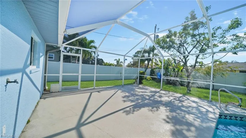 Open screened patio area of pool deck