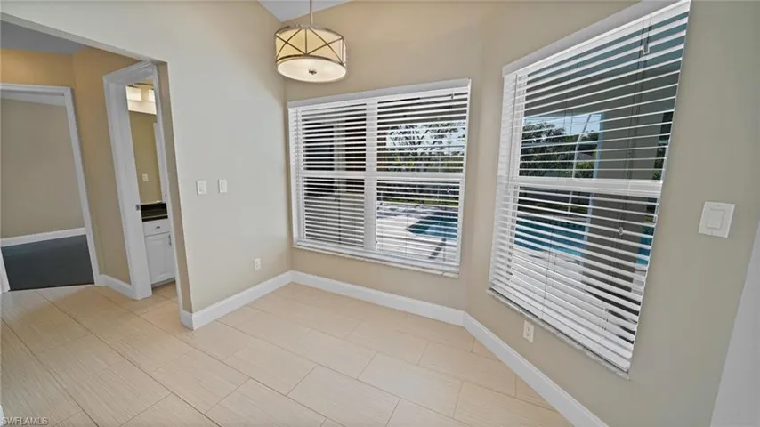 Breakfast nook overlooking pool deck