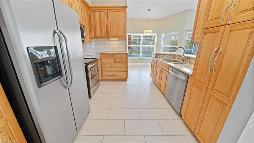 Kitchen looking to breakfast nook