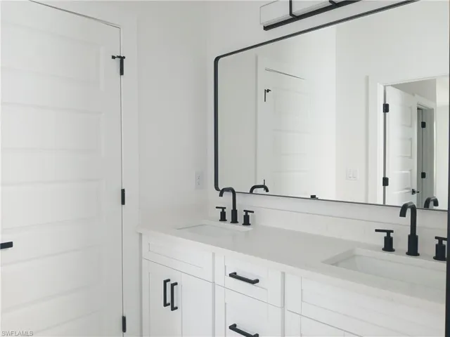 Bathroom with dual vanity