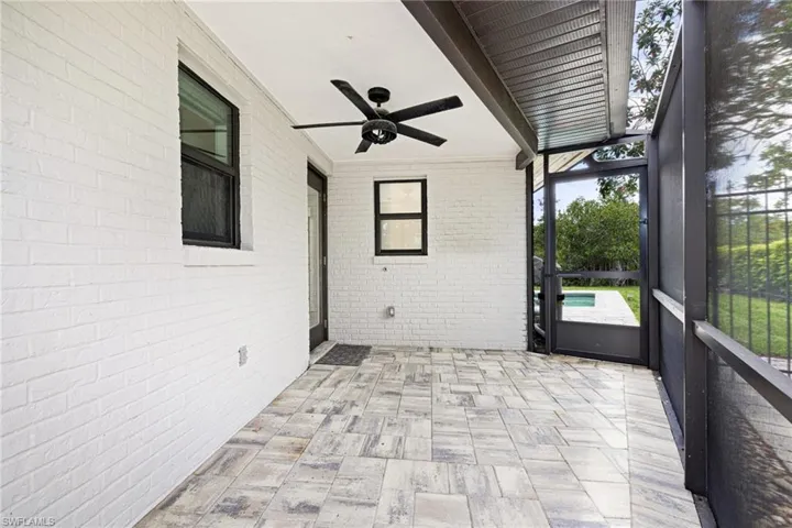 Side Entry to home with screen sitting area