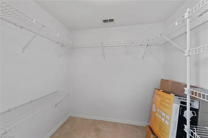 Primary bedroom walk-in closet!