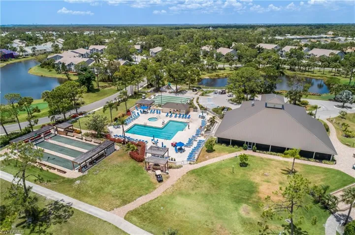 Main pool and clubhouse centrally located in the community. Enjoy swimming laps, working out in the fitness center, Bocce Ball, Shufleboard, Tennis, Pickleball, and BUNDLED GOLF!