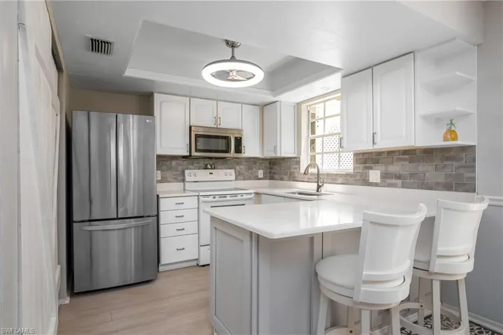 Open Kitchen/Dining space is great for cooking and entertaining guests.