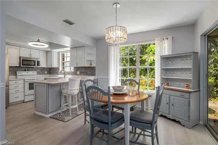 Open floor plan provides plenty of natural light and is perfect for entertaining.