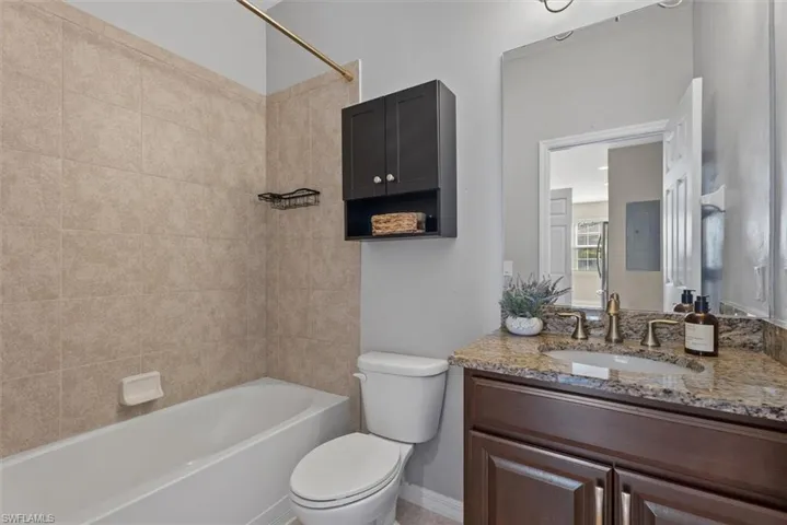 Tiled shower surround with a built-in tub