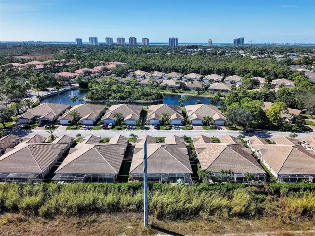 Aerial view of residential area with a large body of water