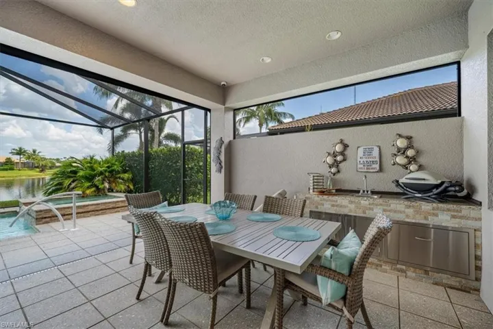 Sunroom with a water view