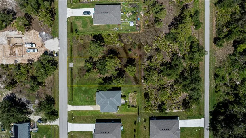 Aerial overview of property's location with property parcel outlined