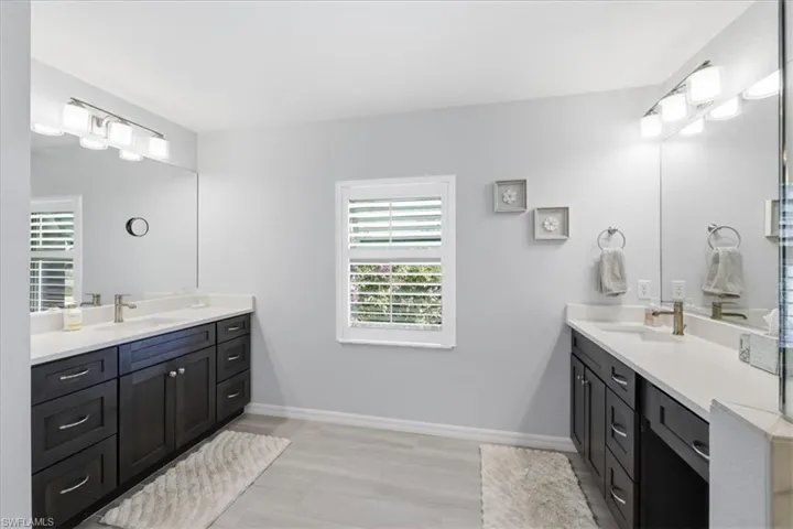Full bath with two vanities