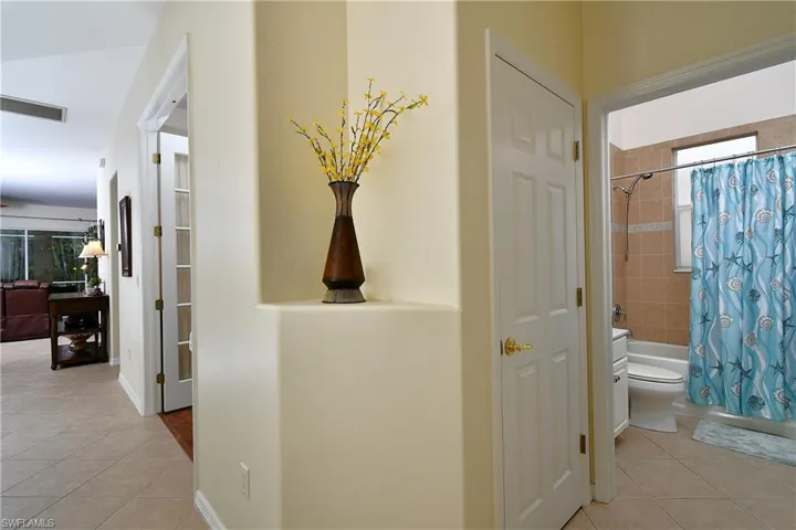 to the right is guest bed and bath