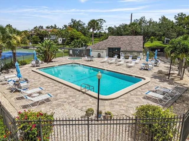 Community pool featuring a patio