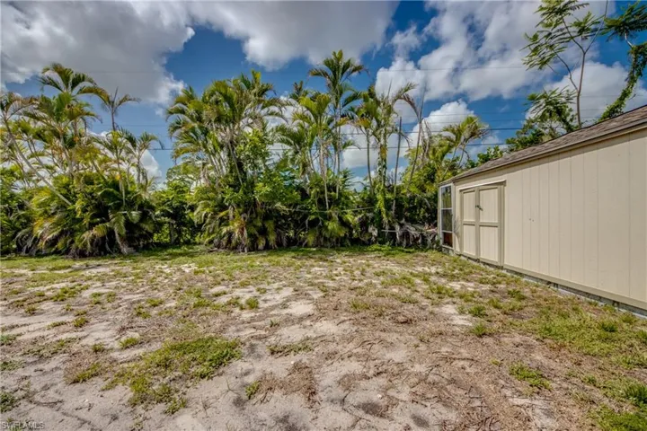 View of yard featuring a storage shed
