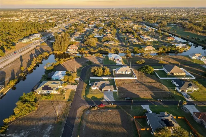 Aerial view at dusk with a water view