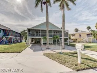 View of front of property with a front yard