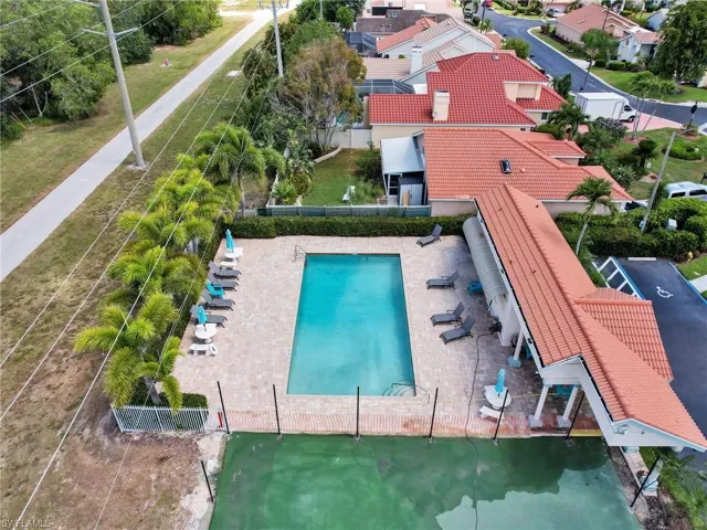View of pool featuring a patio area and a water view