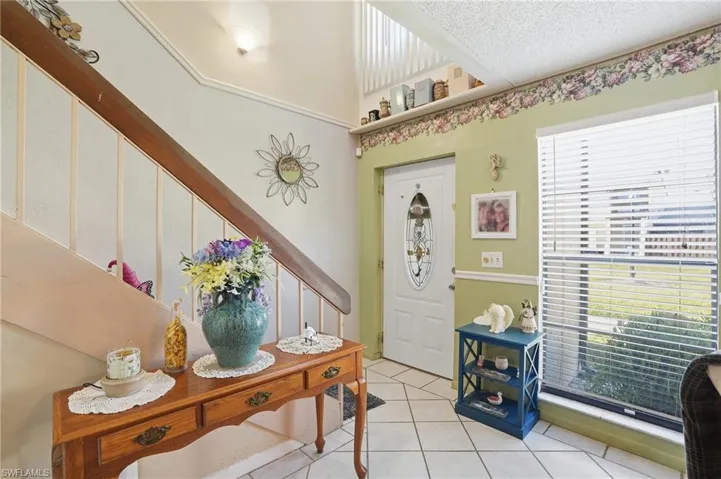 Foyer with light tile