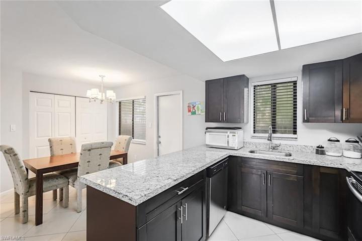 Kitchen and dining open to one another.