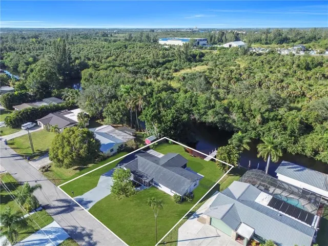 View of property location featuring property parcel outlined and nearby suburban area