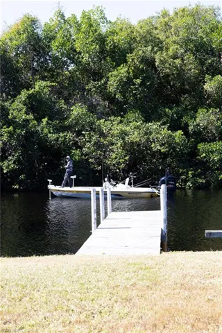 Dock featuring a water view